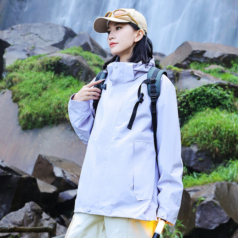 Women’s technical multi-layer hardshell rain jacket with adjustable hood, chest strap, and water-resistant zippers Amarae