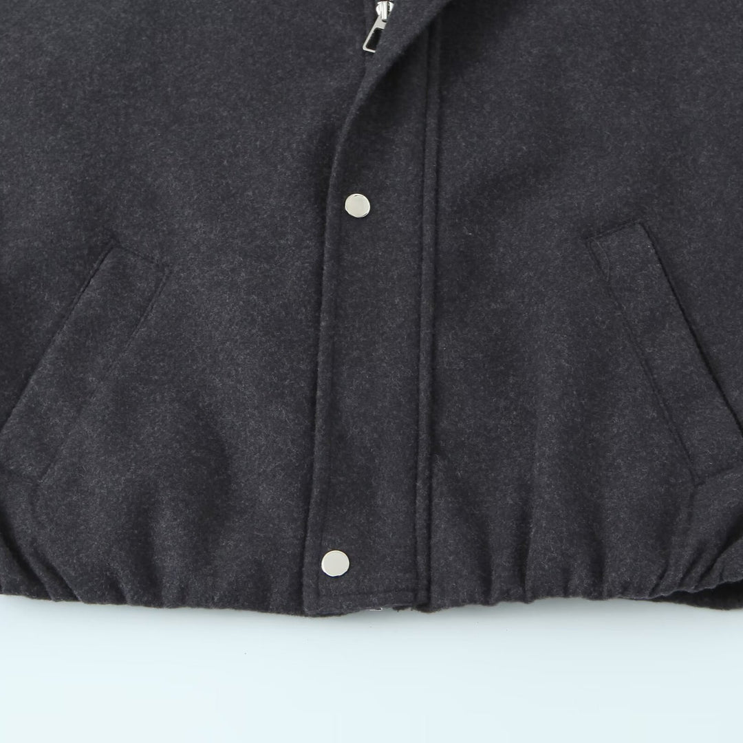 Women's short bomber-style jacket with stand-up collar, snap button placket, and elastic hem Amarae
