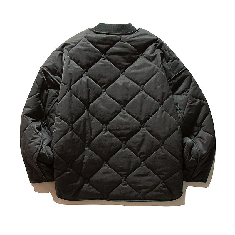 Unisex Lightweight Boxy Puffer Jacket with distinctive diamond quilting, front round pockets, and ribbed collar Amarae
