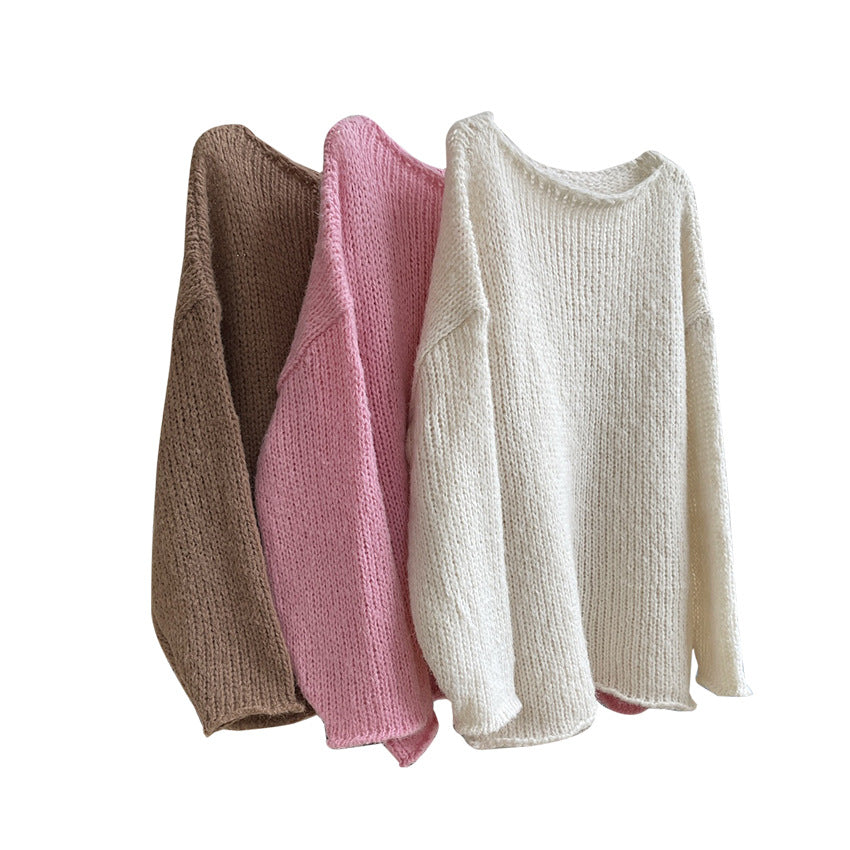 Ladies chunky knit oversized sweater with crew neck and extended hem Amarae