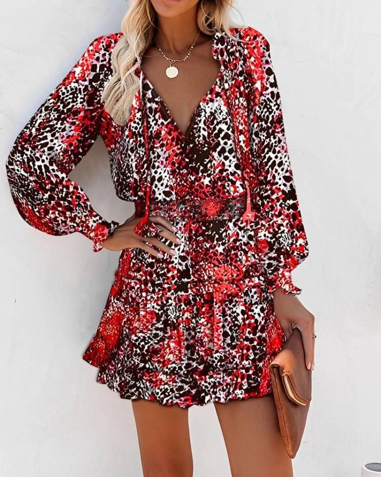 Ladies mini playful dress with colorful pattern and flounced details Lune London