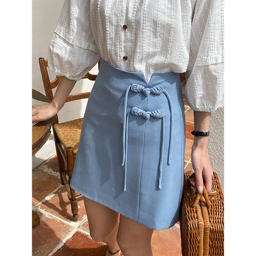 Women's elegant wrap skirt with decorative button details Chic & Stil