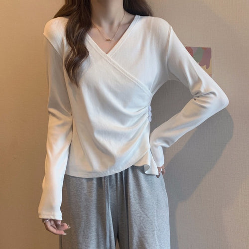 Women's wrap top with button details and ruching Chic & Stil