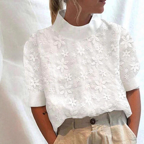 Blouse femme avec design de broderie florale et coupe courte Chic & Stil