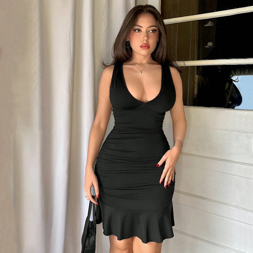Robe portefeuille pour femmes avec une coupe flatteuse et un ourlet volanté Chic & Stil