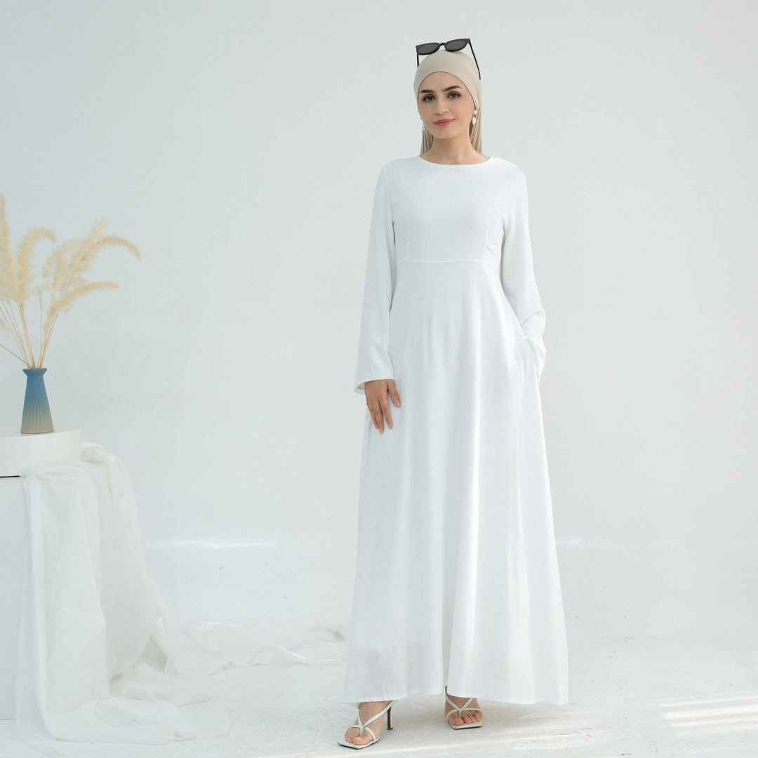 Elegant maxi dress for women with long sleeves and side pockets Lune London