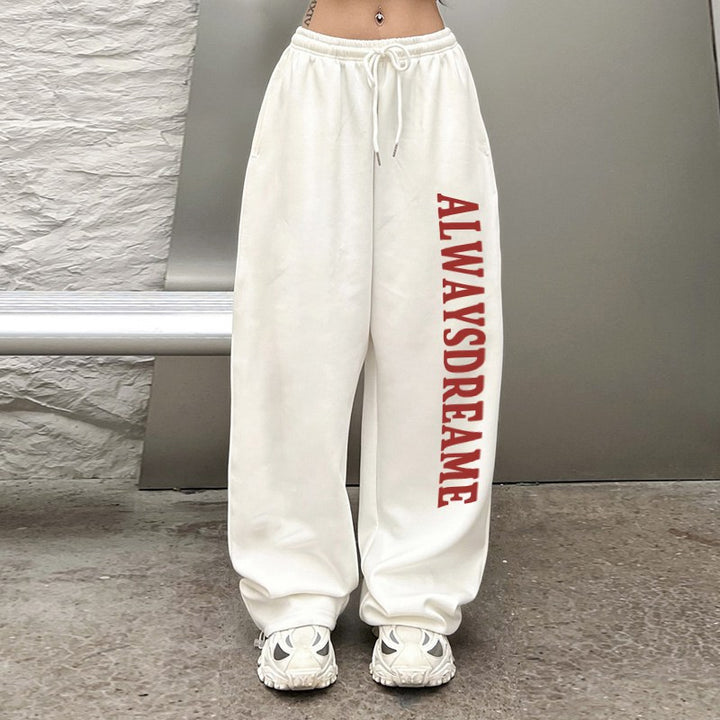 Women’s casual sweatpants with motivational lettering and elastic waistband Chic & Stil