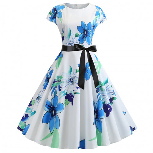 Robe swing femme avec des motifs floraux et une ceinture élégante Chic & Stil