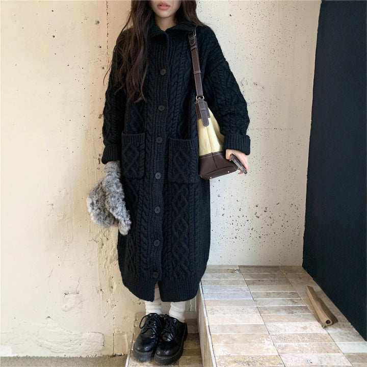Thick knit button coat for ladies with an elegant cable pattern and practical pockets Lune London