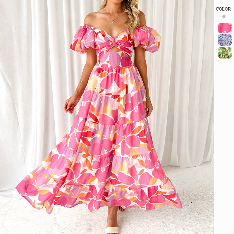 Women's maxi dress with voluminous puff sleeves and floral pattern