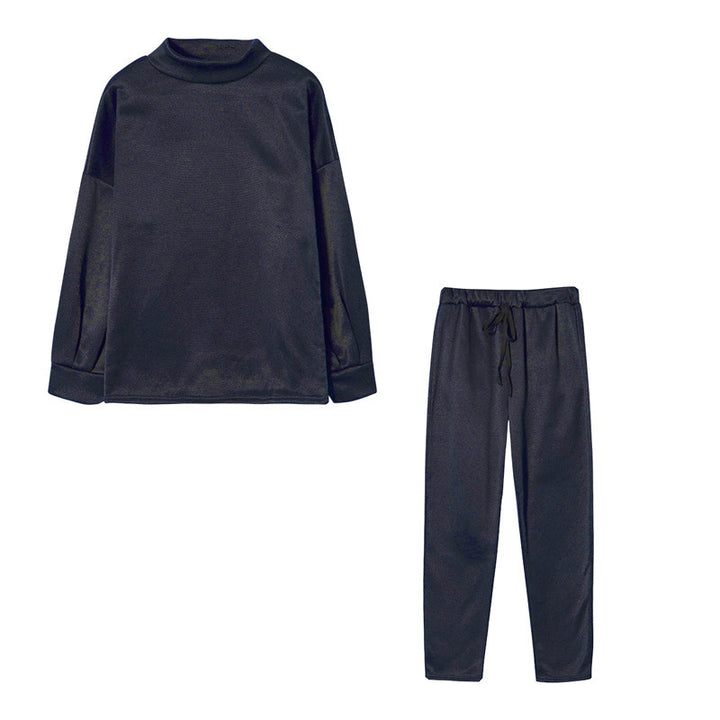 Ensemble de survêtement pour femmes avec une coupe moderne, un haut à col montant et un pantalon élastique Chic & Stil