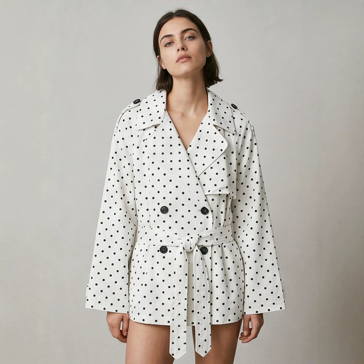 Women’s short trench coat with double breasted front, belt at the waist and polka dot print Amarae