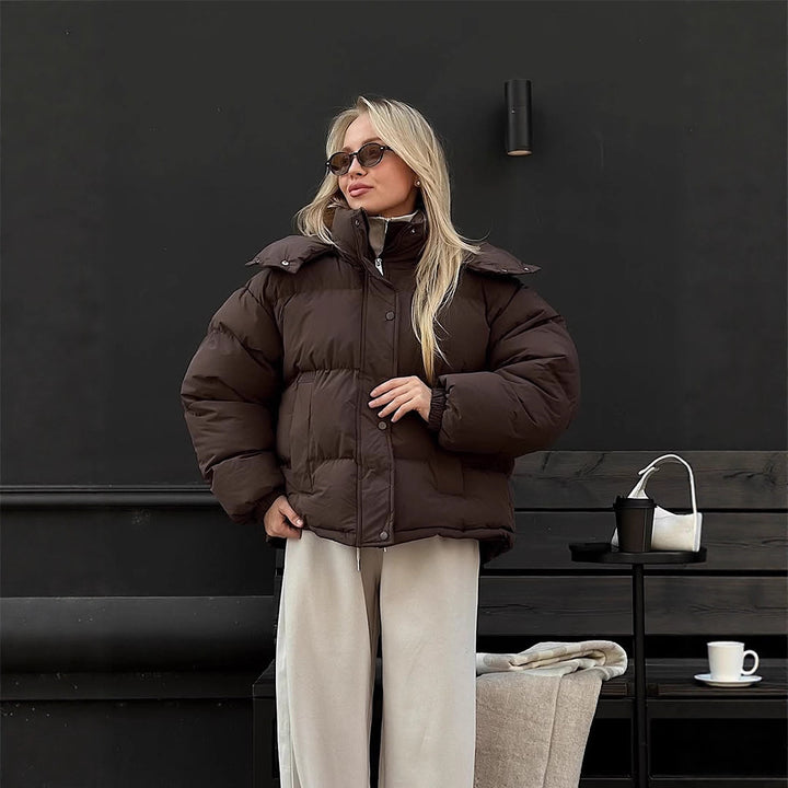 Women's short-cut oversized quilted jacket with high stand-up collar and concealed snap button placket Amarae