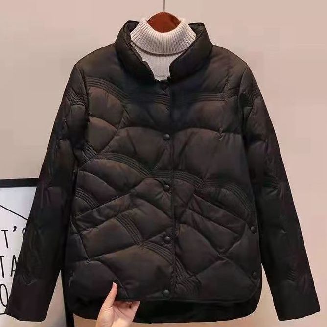 Women's quilted thermal jacket with high collar and decorative wave quilting Amarae
