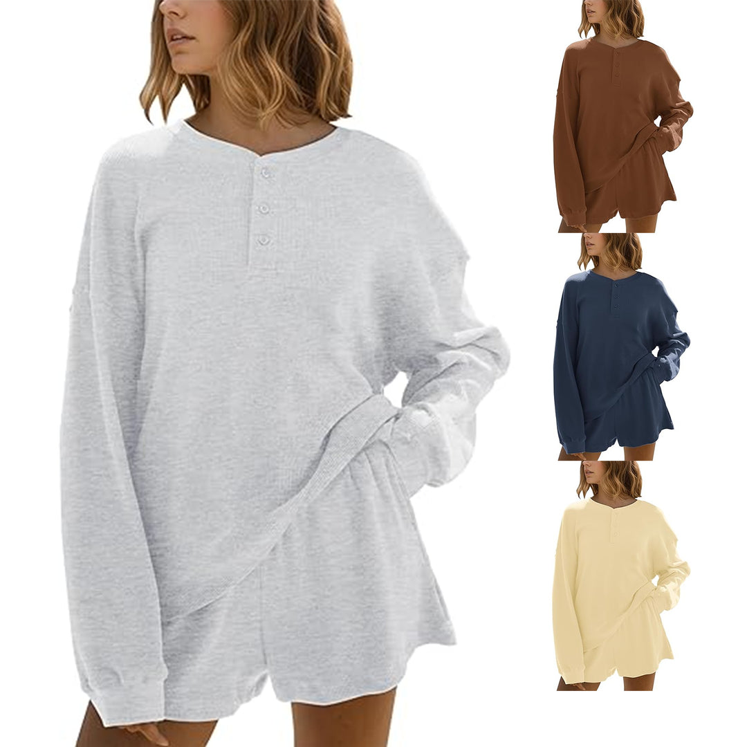 Dames loisirs t-shirt à manches longues pull avec détails de boutons Chic & Stil