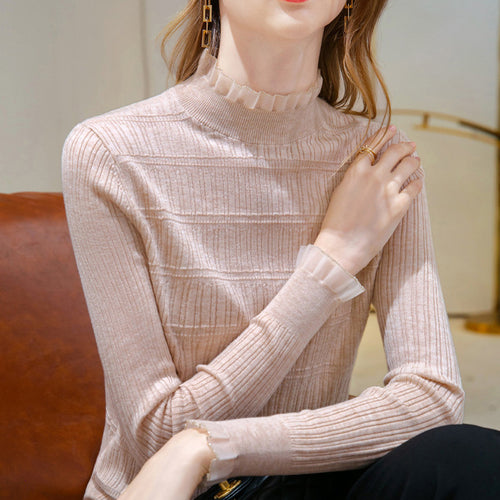 Women’s knitted sweater with elegant ruffled hem and fine texture Amarae