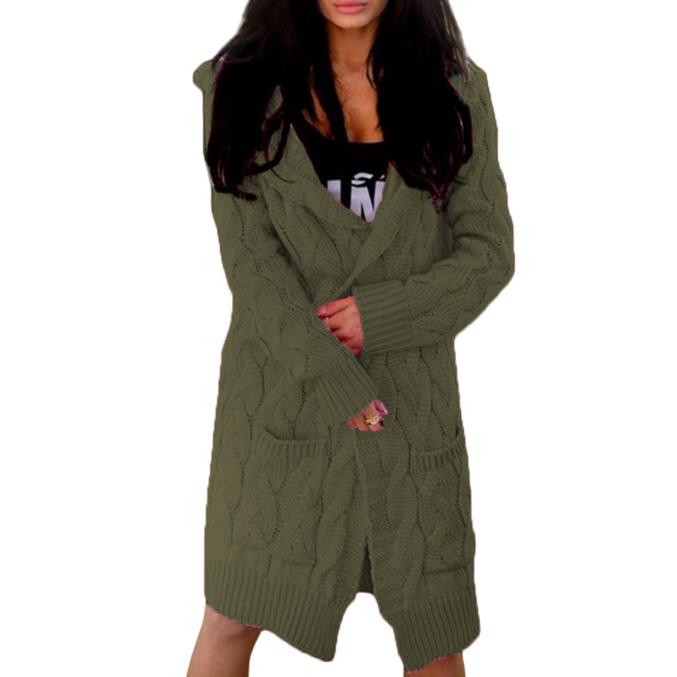 Knitted coat for women with bulky braid pattern and deep pockets Lune London