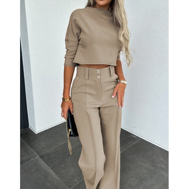Woman trendy cropped top with elegant palazzo pants Lune London