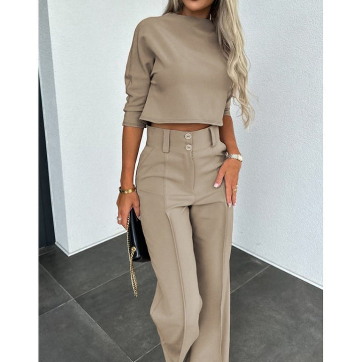 Woman trendy cropped top with elegant palazzo pants Lune London