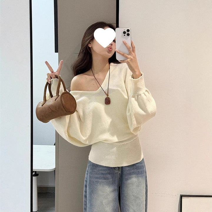 Pull féminin ample avec ceinture ajustable et décolleté en V Chic & Stil
