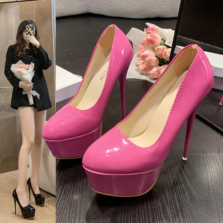 Ladies platform pumps with shiny upper material and high stiletto heel Lune London