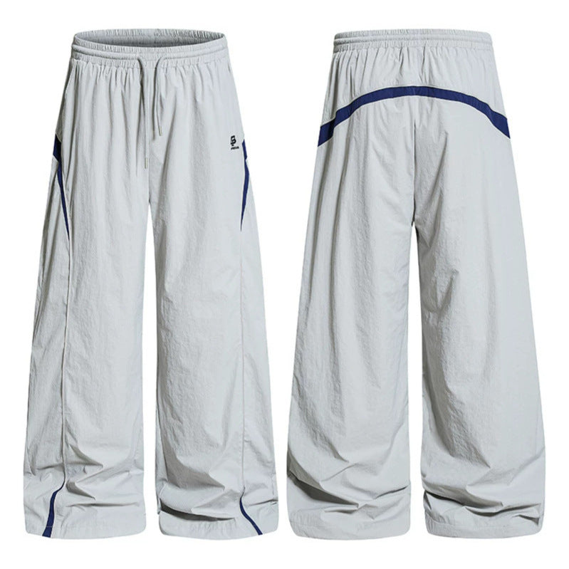 Women Wide Nylon Palazzo Training Pants with Drawstring, Side Contrast Triangles and Adjustable Hem Amarae