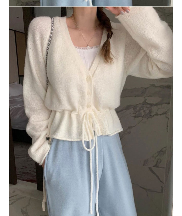 Cardigan pour femmes avec ceinture ajustable et manches aérées Chic & Stil