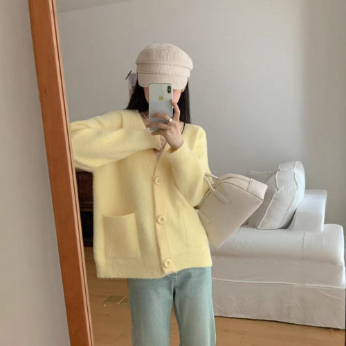 Cardigan pelucheux à boutons pour femmes avec poches élégantes Chic & Stil