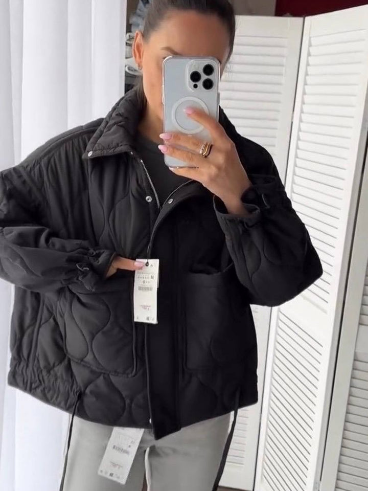 Quilted transitional jacket for women with high collar and drawstring Lune London