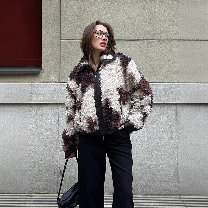 Women's short jacket made of curly bouclé faux fur with leather look detailing Amarae