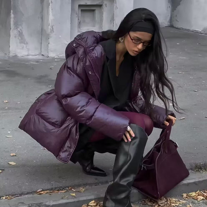 Quilted transition jacket for women with hood and practical side pockets Lune London