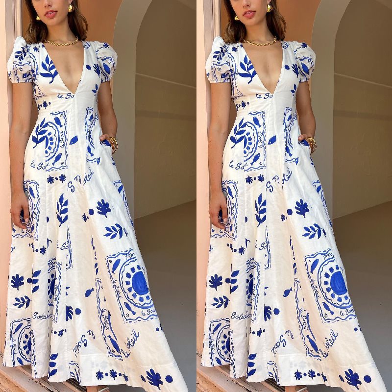 Maxi dress for women with voluminous puff sleeves and floral patterns Lune London