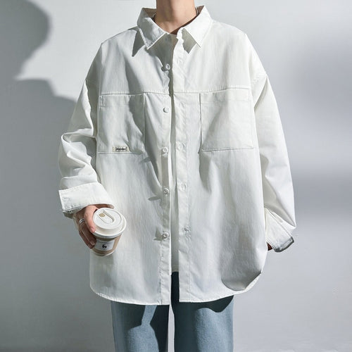 Oversized women's shirt with practical chest pockets Amarae