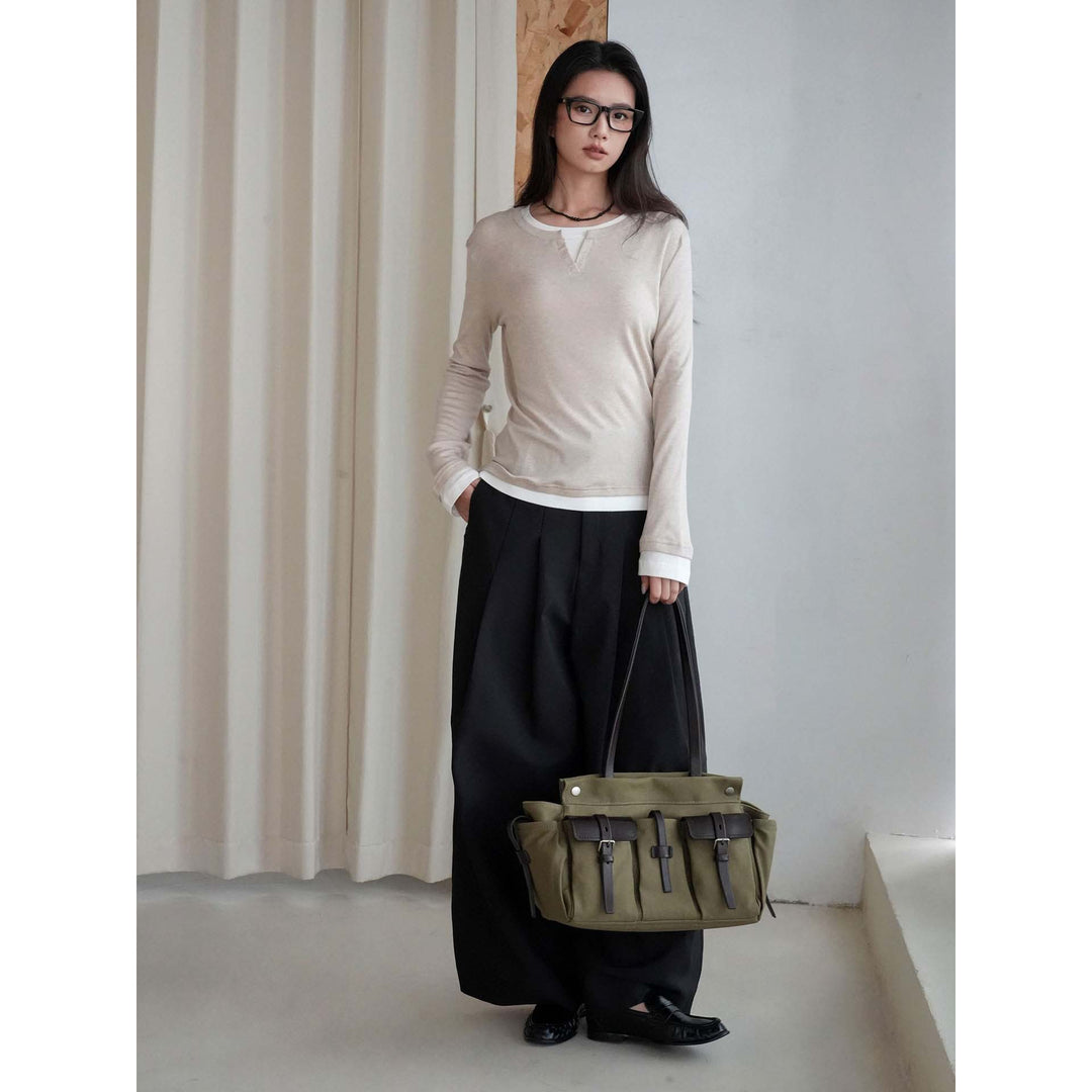 Women layered look long sleeve with notch at the neckline made of soft sweat fabric