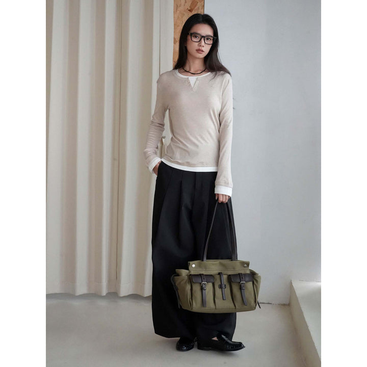 Women layered look long sleeve with notch at the neckline made of soft sweat fabric