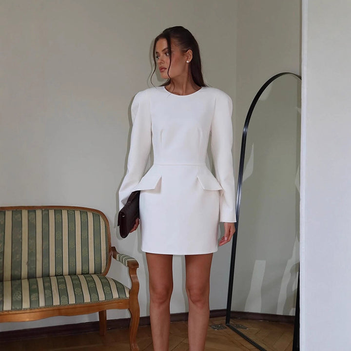 Women Tailored Minidress with Structured Shoulders, Long Sleeves and Suggested Peplum Amarae