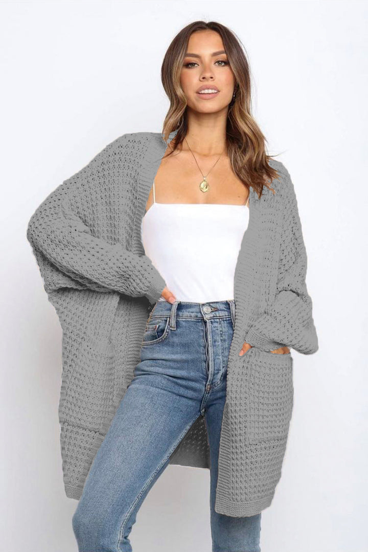 Ladies Large knitted cardigan with a loose fit and deep pockets Lune London