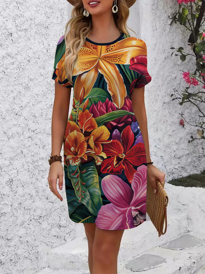 Women's comfortable casual dress with vibrant floral pattern and loose fit Lune London