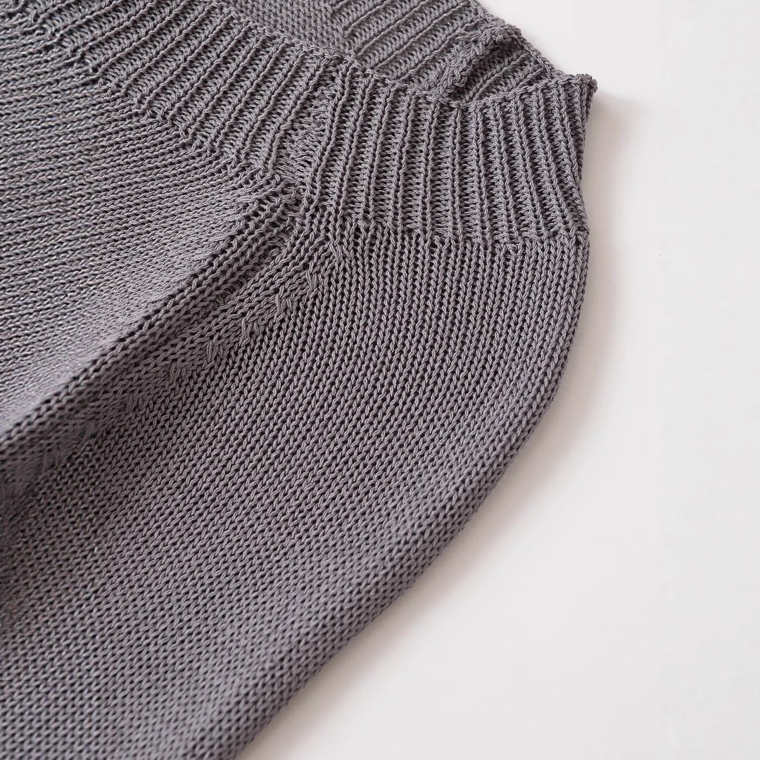 Casual knit pullover for women with button details and a wide round neck Lune London