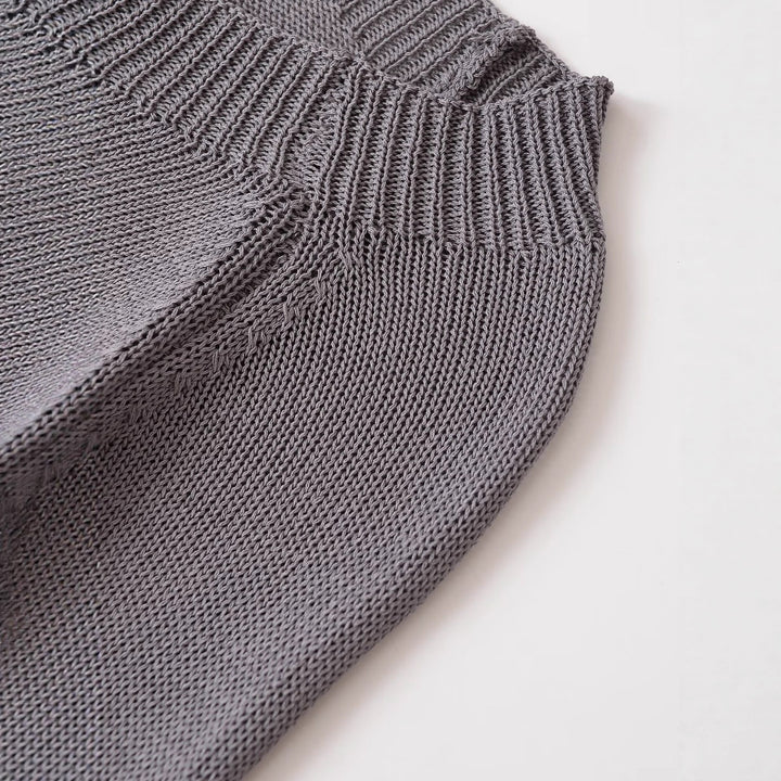 Casual knit pullover for women with button details and a wide round neck Lune London