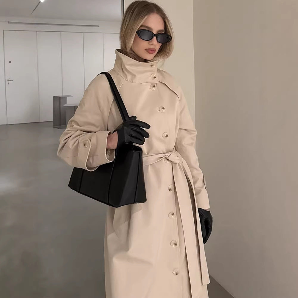 Ladies maxilength trench coat with high stand-up collar, double-breasted button placket and tie belt Amarae