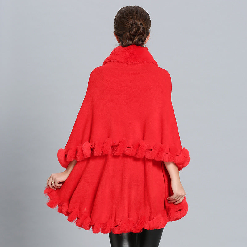 Ladies hooded poncho with luxurious fur collar and elegant trim Lune London