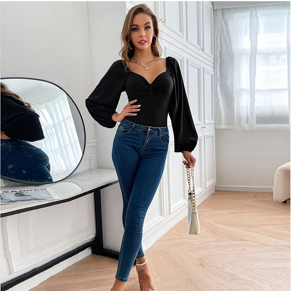 Body pour femme avec un élégant décolleté en V et des manches bouffantes Chic & Stil