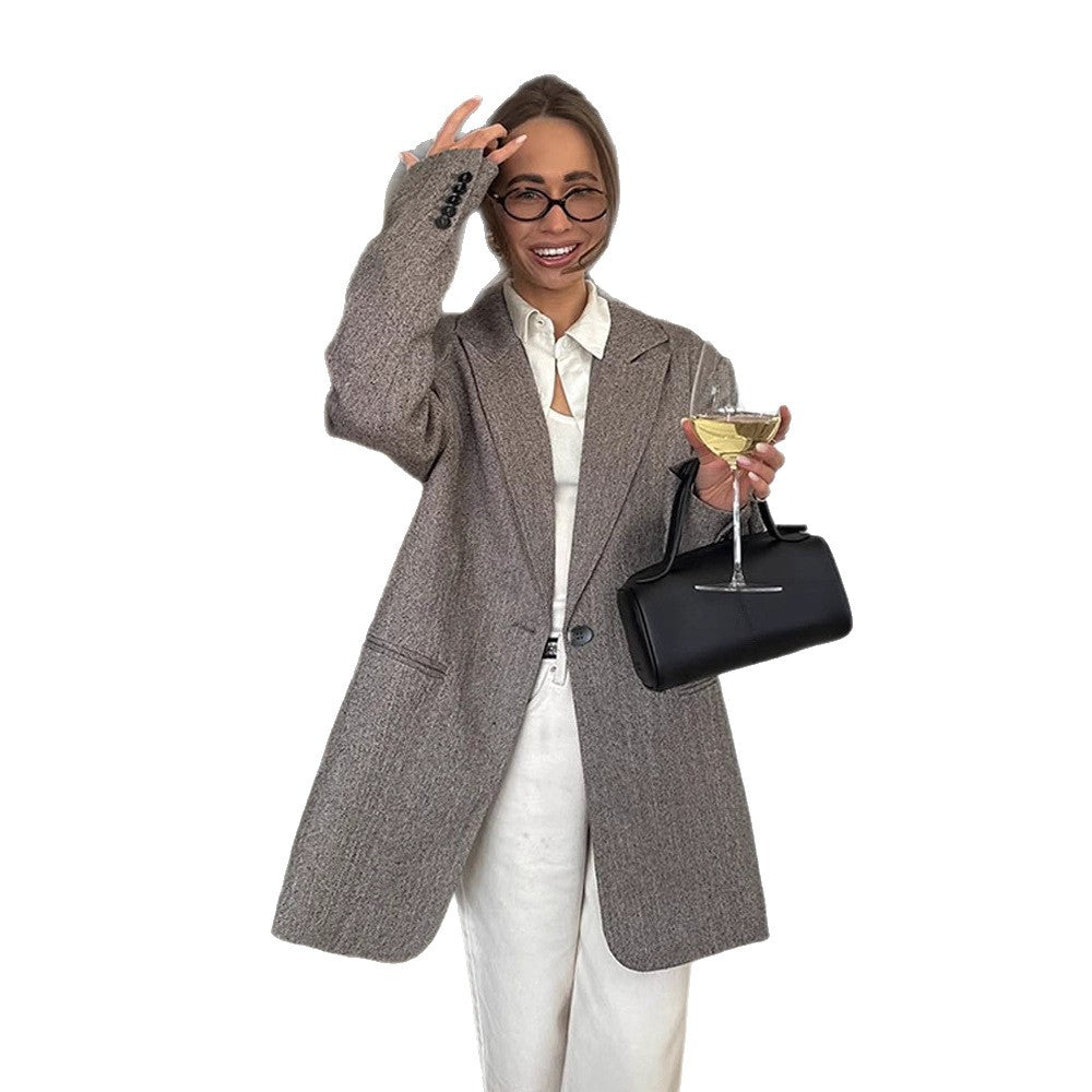Women's long oversized wool blend coat with single-breasted button placket, notched lapels, and side pockets Amarae