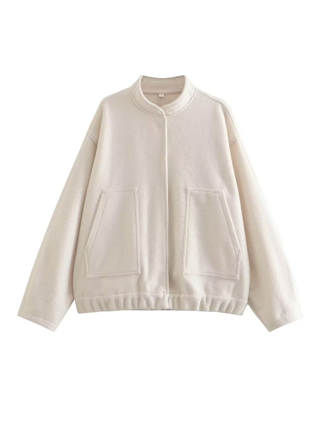 Oversized knit jacket for women in soft teddy fabric with a high collar and side pockets Lune London