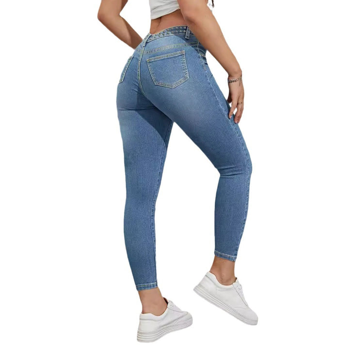 Ladies high-waisted skinny jeans with rhinestone embellishments and ankle-length cut Amarae