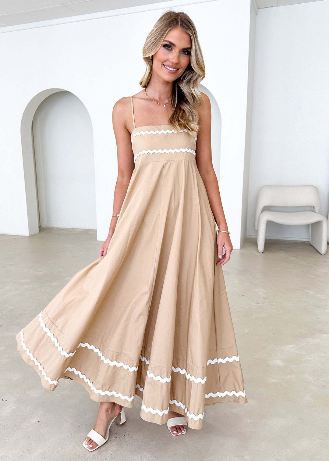 Women's airy long dress with delicate ruffle details and adjustable spaghetti straps Lune London