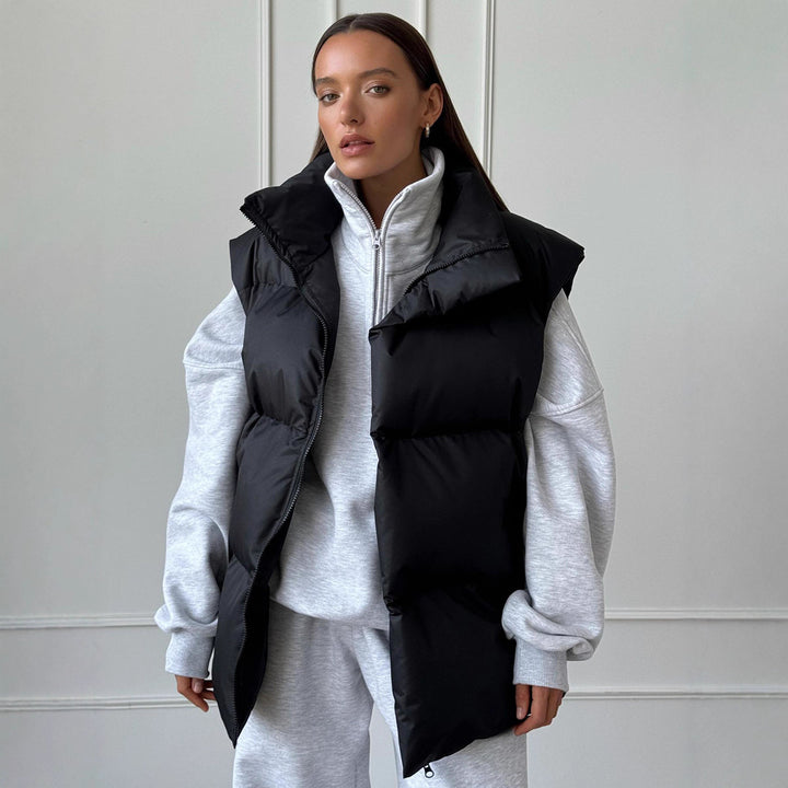 Ladies padded vest with high collar and practical side pockets Lune London