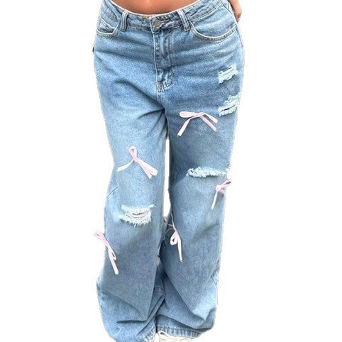 Women High-Waist Baggy Jeans with Vintage Wash, Rips and Pink Bow Applications Amarae