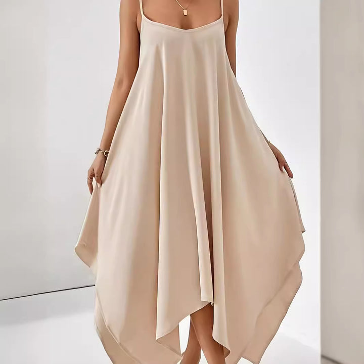 Airy spaghetti strap dress for women with asymmetrical hem and soft fabric Lune London